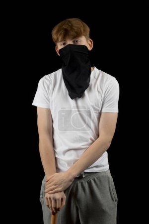 A Teenage Gang Member with a Baseball Bat and Mask against a balck background