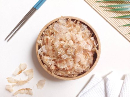 Photo for Katsuobushi. It is preserved food made from skipjack tuna. shaved like wood shavings for the broth. basis of Japanese cuisine, sprinkled on top of food as a flavoring. eaten as a side dish with rice - Royalty Free Image