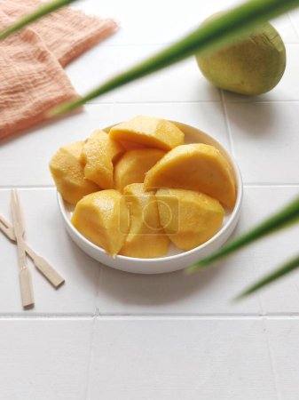 Photo for Honey mangoes. it is one of the mango cultivars from Indonesia.  This mango is called Mango Honey because it tastes very sweet like Honey. top view - Royalty Free Image