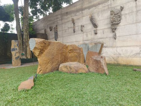 Photo for Bandung-indonesia-july 1 2023: wot batu. one of the tourist attractions in Bandung.  contains artwork from sunaryo.  stone carving art that has a philosophy of spiritual and transcendental journey - Royalty Free Image