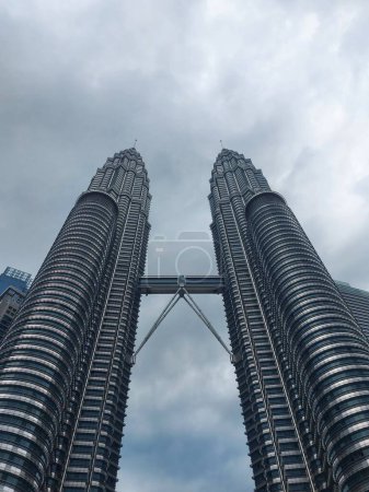 Photo for Kuala lumpur, malaysia-august 12 2023: ThePetronas Towersor Menara Berkembar Petronasal, thePetronas Twin Towersand colloquially theKLCC Twin Towers. - Royalty Free Image