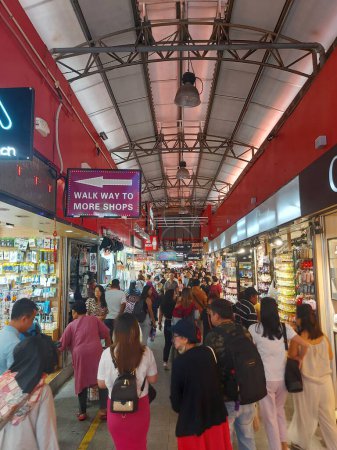 Photo for Bugis, Singapore-august 14 2023: Bugis Street Market. It is well known for being one of the cheapest places in Singapore for sourcing your souvenirs, accessories, clothes, electronics, houseware, etc - Royalty Free Image