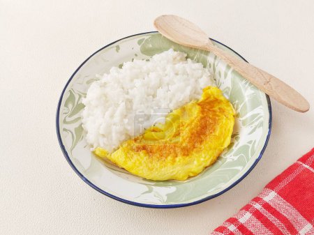 Photo for Rice with omelette on enamel plate. Isolated background in white - Royalty Free Image