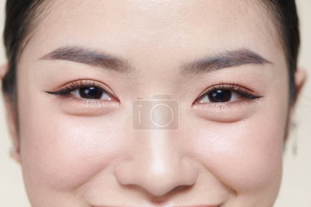 A half of a beautiful female's face with eye bags