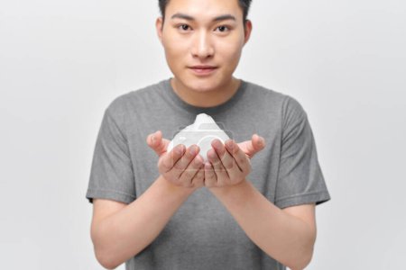 Photo for The Asian man with facial foam. - Royalty Free Image
