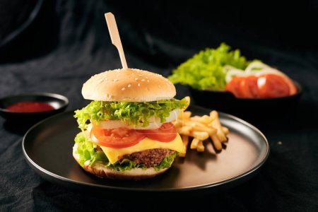 Photo for Homemade burger and cheese with fries - Royalty Free Image