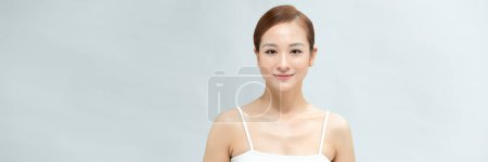 Photo for Asian Woman with beautiful face on banner background - Royalty Free Image