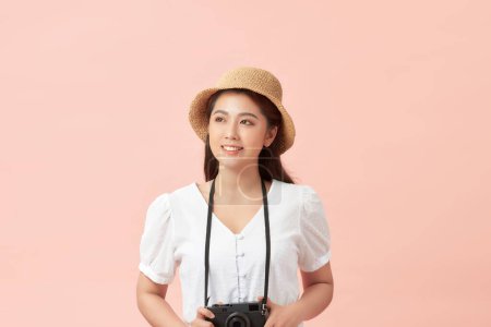 Photo for Asian woman hipster traveler with camera and hat in casual clothing - Royalty Free Image