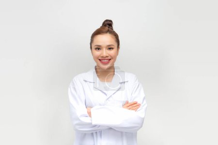 Photo for Smiling  young female doctor on light background - Royalty Free Image