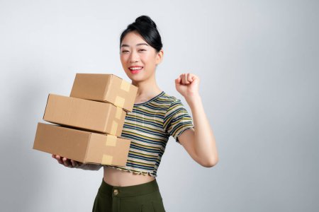 Photo for Portrait of beautiful happy woman carry boxes with orders. - Royalty Free Image