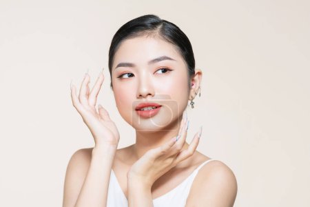 Young perfect woman face with clear skin, skincare concept