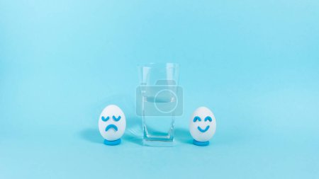 An egg with a cheerful expression rushing on a wave of good luck. The concept of a successful life position of an optimist. Blue background. Copy space.
