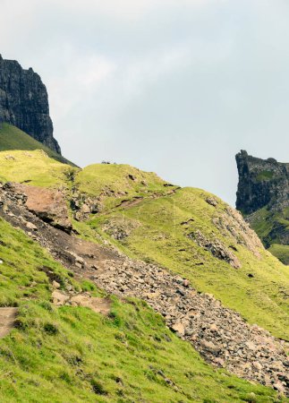 Photo for During the summer,featuring unique dramatic escarpments and a seven kilometer hiking loop,with jagged peaks and impressive views over Skye. - Royalty Free Image