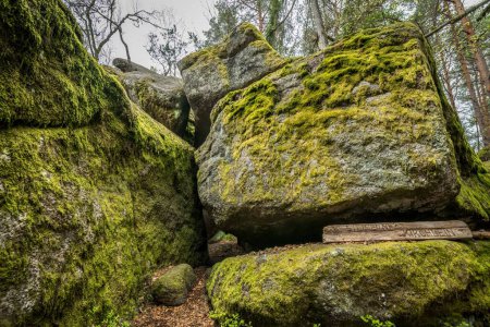 Photo for From outside of the Stone church in Thurmansbang - Old church built in a stone cave between erratic rocks and large stones in the Bavarian Forest, Germany - Royalty Free Image