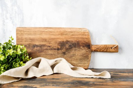 Foto de Background with wooden cutting board and kitchen towel. Kitchen interior mock up for design and product display. - Imagen libre de derechos