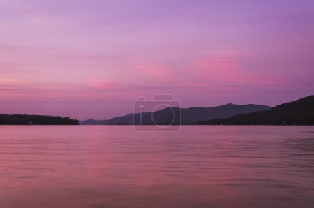 a colorful sunset on Lake George at dusk in New York.