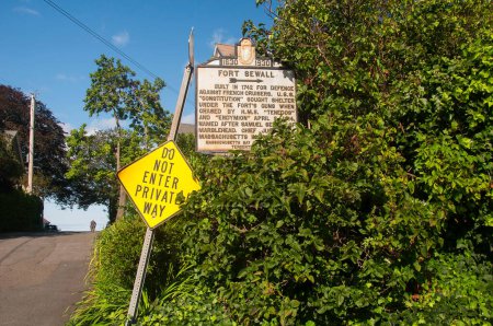 the sign for a the historic Fort Sewall in Marblehead Massachusetts on a sunny summer day.