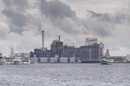 Photo for Baltimore, Maryland. September 30, 2019. The historic Domino sugar factory within the inner harbor located in Baltimore Maryland on an overcast day. - Royalty Free Image