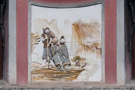 Mural de viajeros chinos en el templo chi wan tian hou en China Shenzhen.