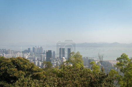 The Nanshan district of shenzhen china from atop Guishan mountain on a sunny day.
