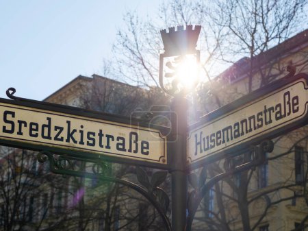Photo for Street name signs of Sredzkistrasse and Husemannstrasse in Berlin, main streets in the Prenzlauer Berg district, East Germany - Royalty Free Image