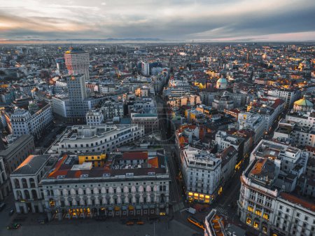 Drone view of Milan cityscape at sunset