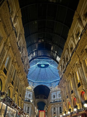 Photo for The Gucci Christmas Tree Is Not a Tree. An installation of 78 gift boxes sealed with Gucci signature Milan iconic Galleria Vittorio Emanuele II. Milan, Italy 12.12.2023. - Royalty Free Image