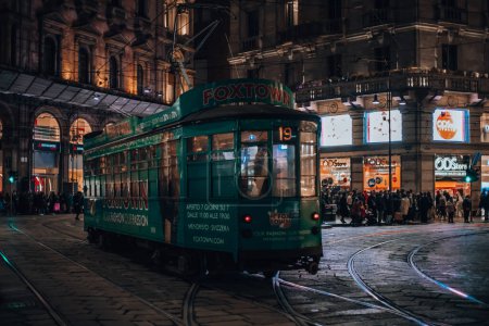 Photo for Milan, Italy 12.12.2023. Evening view of a tram in the center of Milan. Evening Milan during Christmas. High quality photo - Royalty Free Image