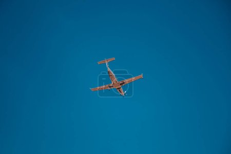 Photo for Italy, Lombardy, Milan 1.12.2023. Airplane against blue sky. The plane lands at the Italian airport Linate. High quality photo - Royalty Free Image
