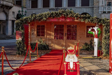 Photo for Santa Claus Office in Bergamo, Italy. Festive interior inside wooden house, New Years cheerful mood Spirit of Christmas. - Royalty Free Image