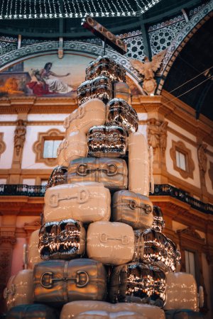 Photo for Italy, Milan 25.12.2023 - Gucci Christmas Tree in Milan. luxury shopping gallery Vittorio Emanuele II. High quality photo. - Royalty Free Image