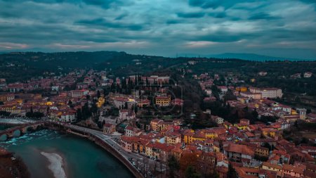 Aerial view of Verona and Adige river at sunset, Veneto region, Italy. Traditional Italian architecture. High quality photo