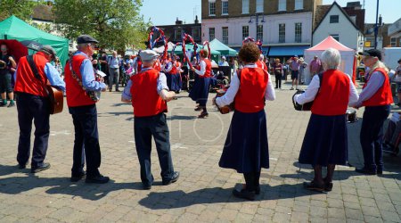 Photo for ST NEOTS, CAMBRIDGESHIRE, ENGLAND -  JUNE 10, 2023: Morris dancers and musicians  on St Neots market square Cambridgeshire. - Royalty Free Image