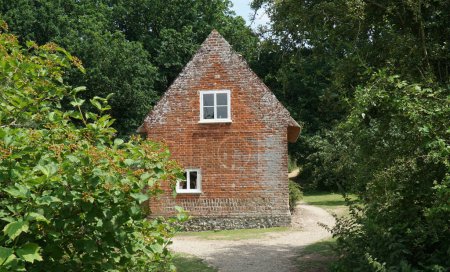 Photo for LUDHAM, NORFOLK, ENGLAND -JULY 08, 2023: Toad Hole Cottage Museum at How Hill National Nature Reserve - Royalty Free Image