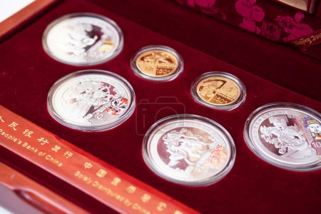 Photo for 03/11/2023. Lvov, Ukraine.gold and silver coins from the Olyspian games in Beijing, China. - Royalty Free Image