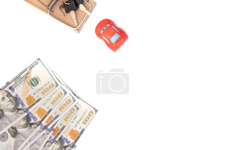 Photo for The keys to the door and the car are in the mousetrap. Banknotes, a car, a bunch of keys, a mousetrap - there is no such thing as a cheap car! - Royalty Free Image