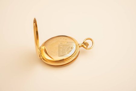 Photo for 15/04/2023. Lvov Ukraine. vintage gold pocket watch longines isolated on white background - Royalty Free Image