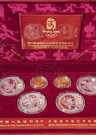 Photo for 03/11/2023. Lvov, Ukraine. gold and silver coins from the Olyspian games in Beijing, China. - Royalty Free Image