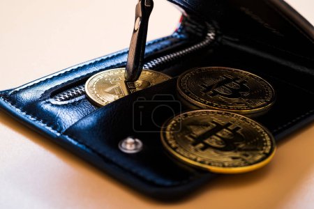 Photo for Wallet and bitcoin coin. The concept of buying and selling cryptocurrency. cryptocurrency income. - Royalty Free Image