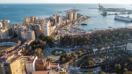 aerial view footage of city Puerto, park, bay and downtown of Malaga, Andalusia, Spain. High quality FullHD drone video 