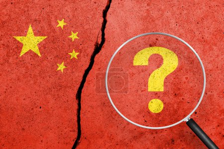Photo for China flag painted on a cracked concrete background. China finance, real estate and debt crisis. China economic collapse. View through magnifying glass - Royalty Free Image