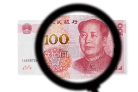 Photo for One hundred yuan note on a white background. View through magnifying glass - Royalty Free Image