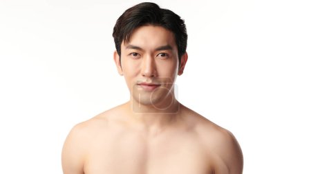 Téléchargez les photos : Portrait of shirtless young handsome Asian man for skincare and beauty concepts against on white background, - en image libre de droit