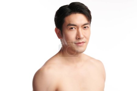 Foto de Portrait of shirtless young handsome Asian man for skincare and beauty concepts against on white background, - Imagen libre de derechos