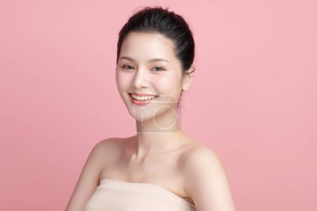 Photo for Beautiful young asian woman with clean fresh skin on pink background, Face care, Facial treatment, Cosmetology, beauty and spa, Asian women portrait. - Royalty Free Image