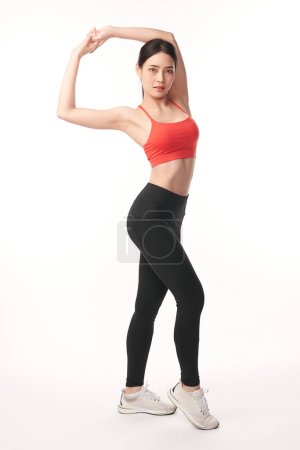 Photo for Beautiful young asian sport woman with sportswear ready for exercise on white background, Advertising sportswear and yoga wear, Healthy lifestyle, sport. - Royalty Free Image