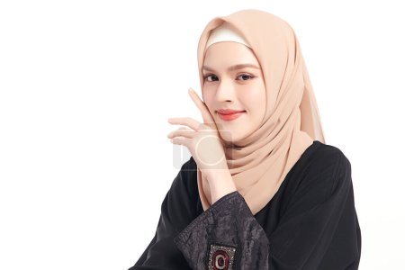 Photo for Beautiful young asian muslim woman wearing a beige hijab on white background, Portrait of Arab Beauty. - Royalty Free Image