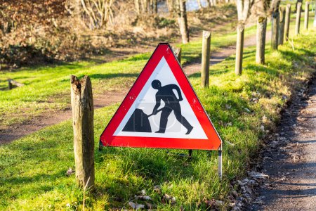 Photo for UK Traffic sign stating Road Works ahead on a red and white warning triangle - Royalty Free Image