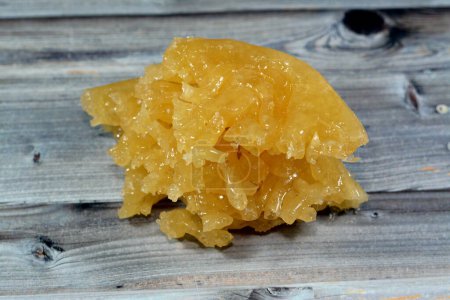 Photo for Egyptian Meshabek, It is a rounded sweet made of a deep-fried crunchy batter soaked either in honey or sugar syrup. Its name translates to (twisted), originating from Tanta and Damietta cities - Royalty Free Image