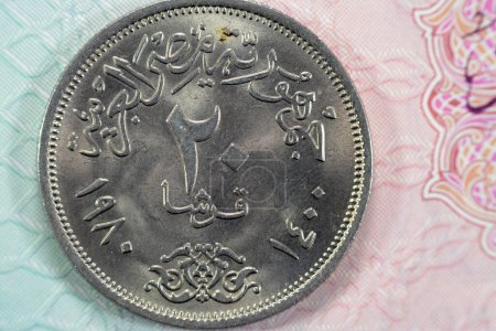Photo for Reverse side of Twenty Egyptian Piasters of United Arab Republics of Arab Republic of Egypt series 1980 AD 1400 AH, vintage retro old ancient Egyptian silver riyal 20 Piastres coin, selective focus - Royalty Free Image